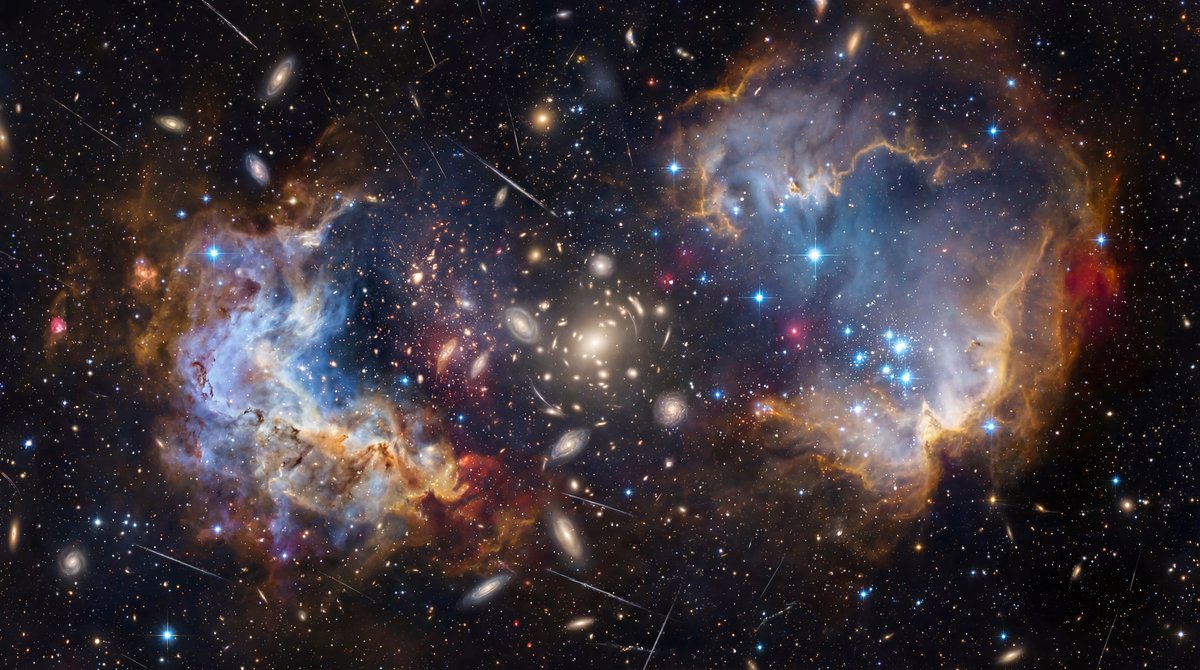 Vibrant deep space image filled with colorful galaxies and stars, with faint glowing trails of asteroids crossing the void.