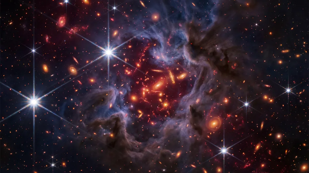 Swirling clouds of cosmic dust obscuring glowing red and amber galaxies in a starry deep space field.