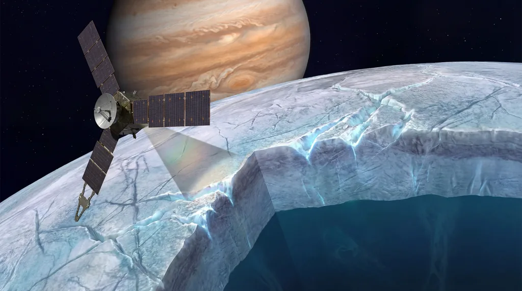 Cross-section of Europa revealing thick ice and hidden ocean, with Juno spacecraft flying by and Jupiter in background.