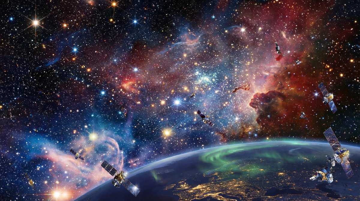 Thousands of glowing futuristic satellites orbiting Earth against a deep space backdrop of vibrant nebulas and bright stars.